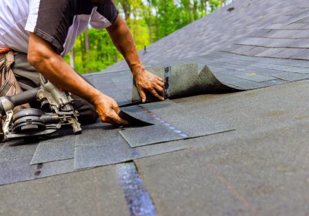 worker doing roof repair